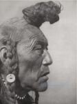 photo of a Blackfoot by Edward Curtis, hairstyle described in Naapiikoan Winter as a similar one worn by the character Saahkómaapi (Young Man), Beaver Bundle Man to the Inuk’sik band of the Piikáni, the band’s Dreamer